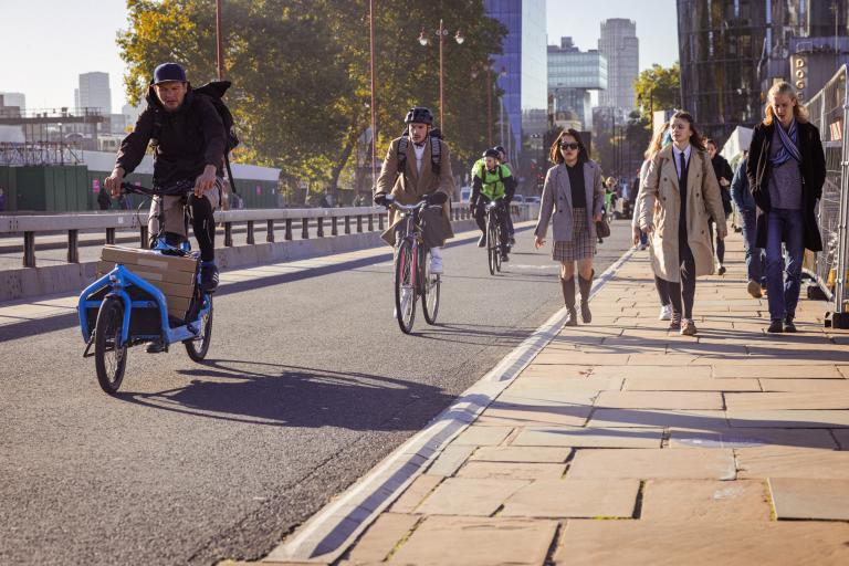 People walking and cycling in Blackfriars, London.