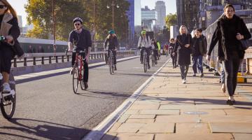 People walking and cycling in Blackfriars, London.