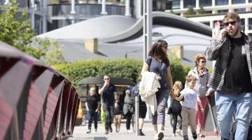 Family walking in Granary Square.