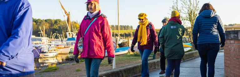 Women walking near a river in Kesgrave.